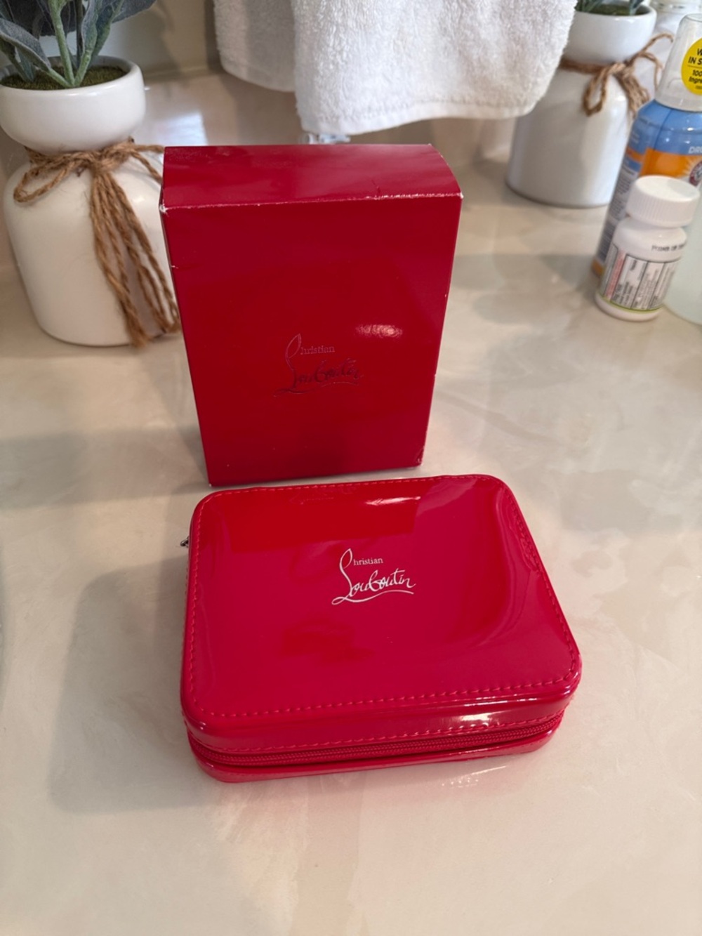 Christian Louboutin Glossy Patent Jewelry Case in Red